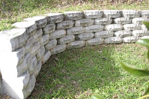 A finished lock-block retaining wall